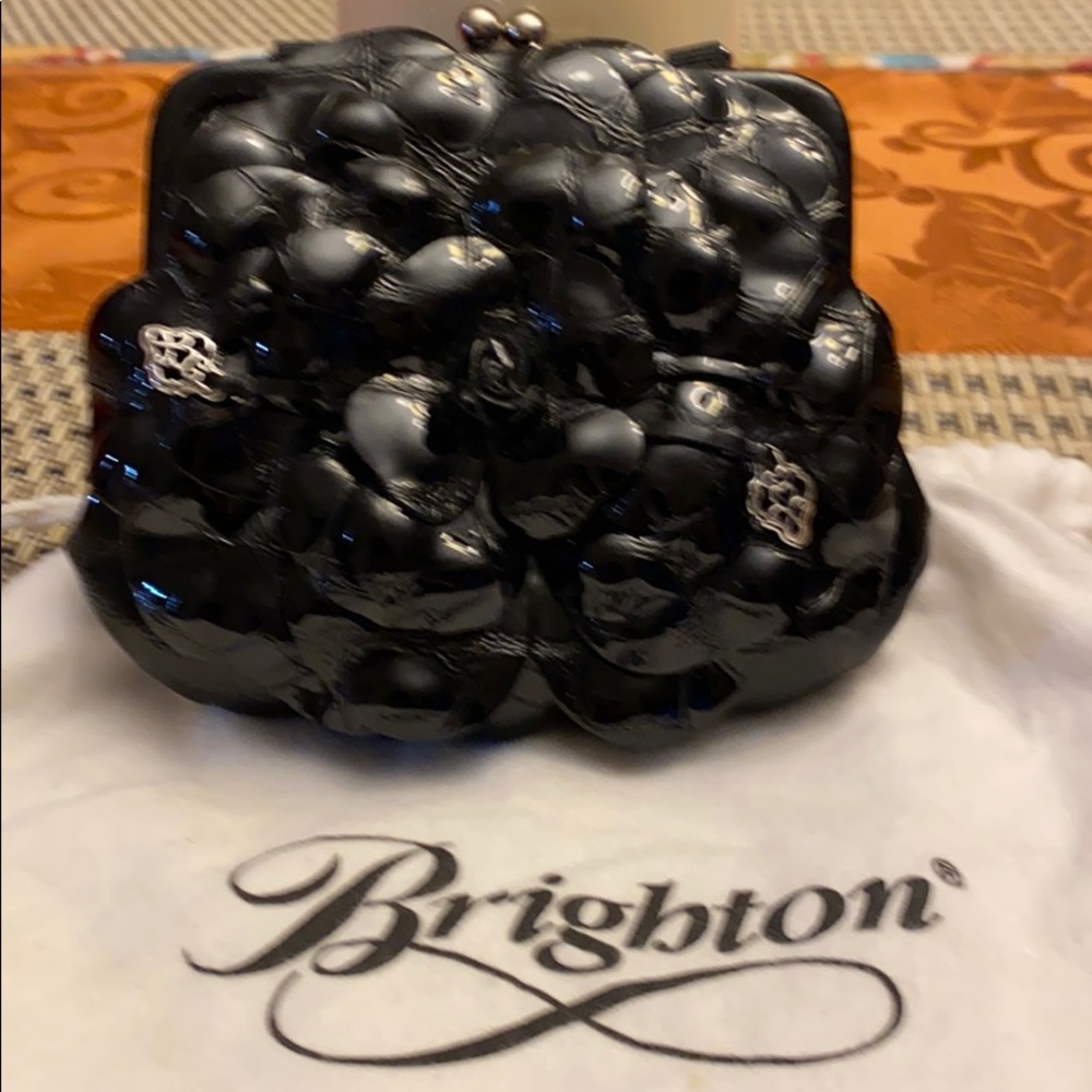 Brighton’s leather flower evening and holiday bag